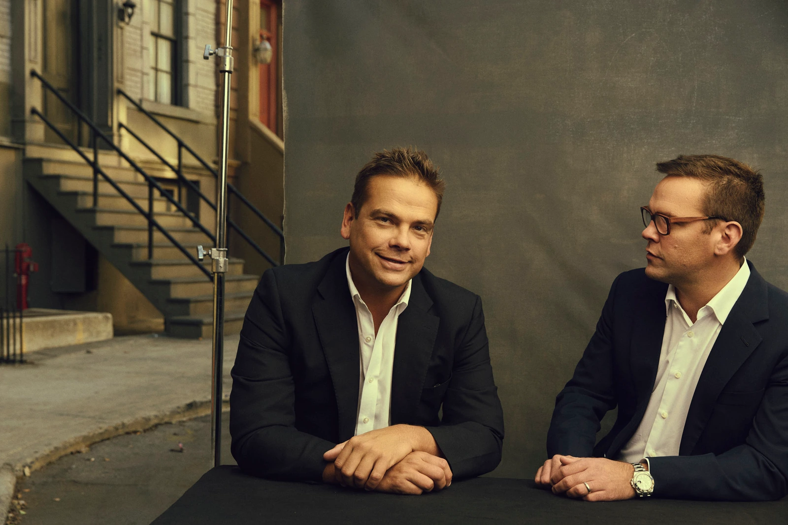 Portrait of Media heirs Lachlan and James Murdoch on Fox backlot Los Angeles, photographed by Austin Hargrave