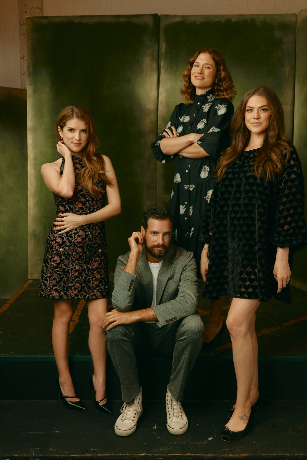 Anna Kendrick, Charlie Carrick, Mary Nighy, and Kaniehtiio Horn against a patinated green backdrop at TIFF 2022.