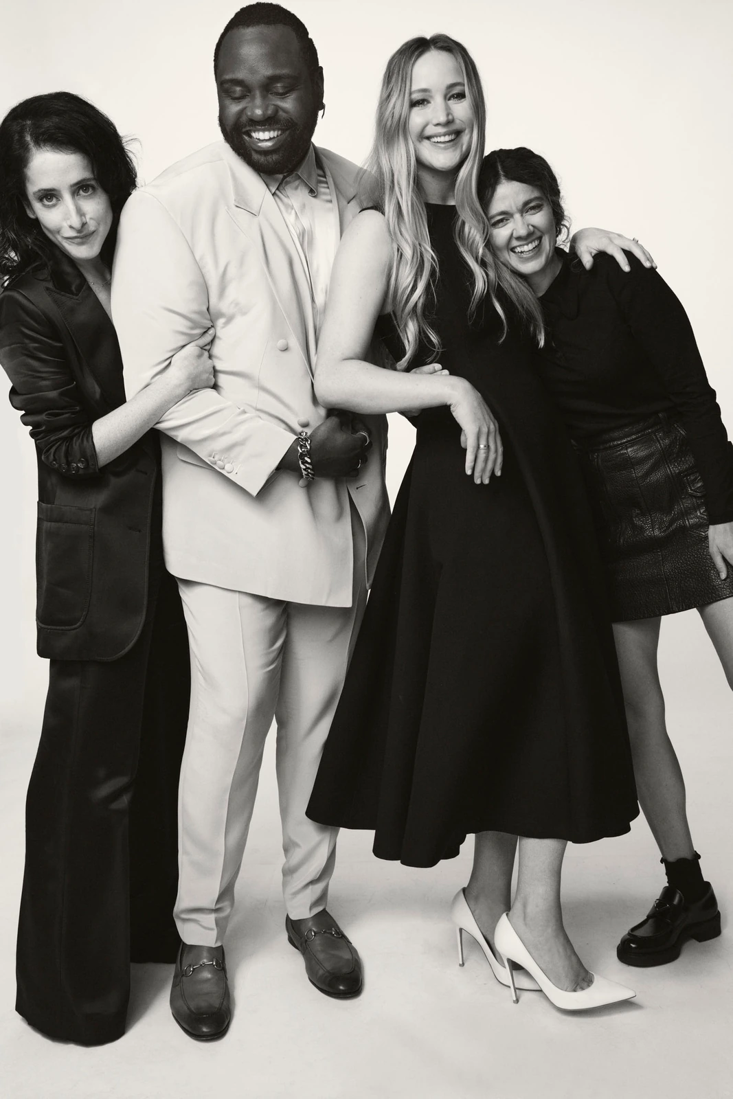 Lila Neugebauer, Brian Tyree Henry, Jennifer Lawrence, and Justine Ciarrocchi laughing together in B&W at Toronto Film.
