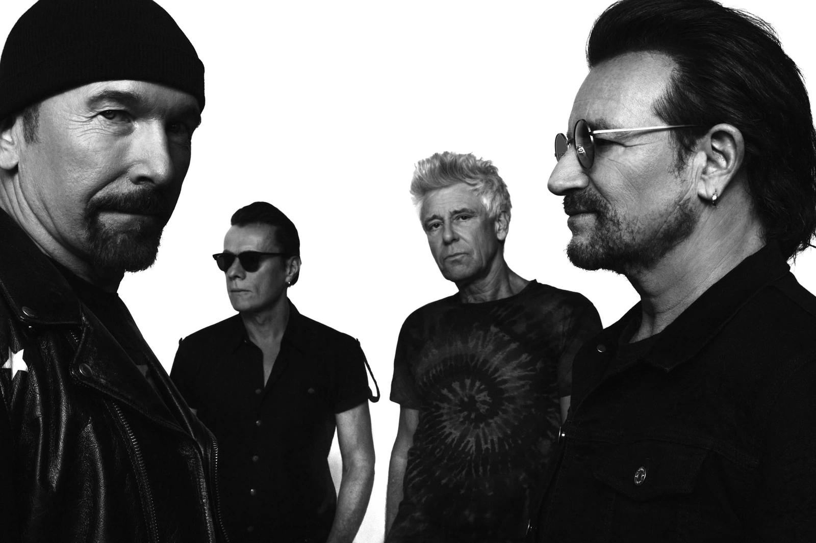 Rock band U2 — Bono, The Edge, Larry Mullen Jr. and Adam Clayton — in stark black-and-white for The Sunday Times Magazine.