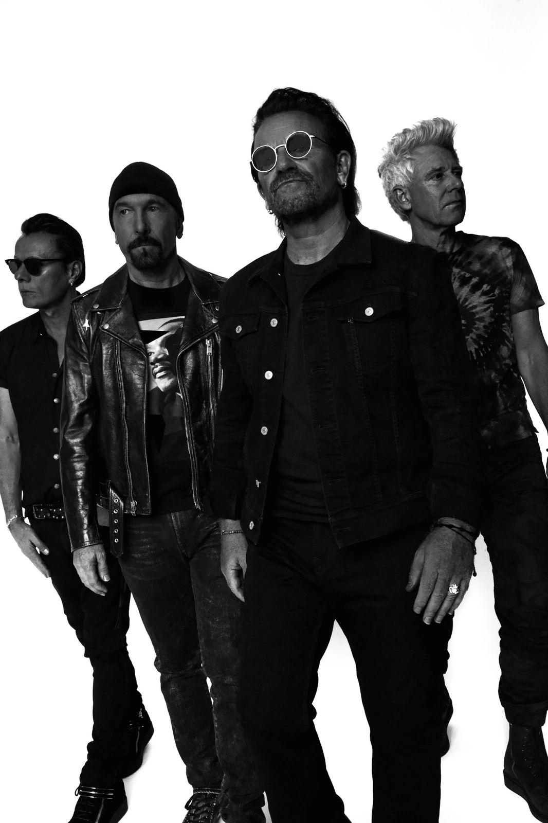 U2 — Bono, The Edge, Adam Clayton, Larry Mullen Jr. — in sharp B&W against white, by Austin Hargrave for The Sunday Times.