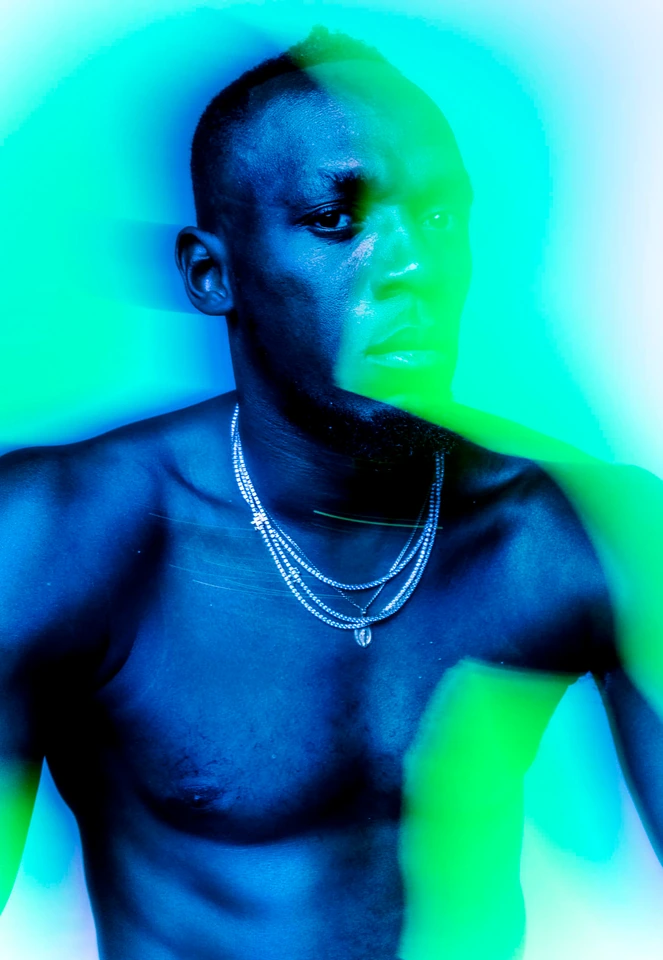 Usain Bolt shirtless in layered silver chains, bathed in electric cyan and green gel light, gaze lifted, for The Sunday.